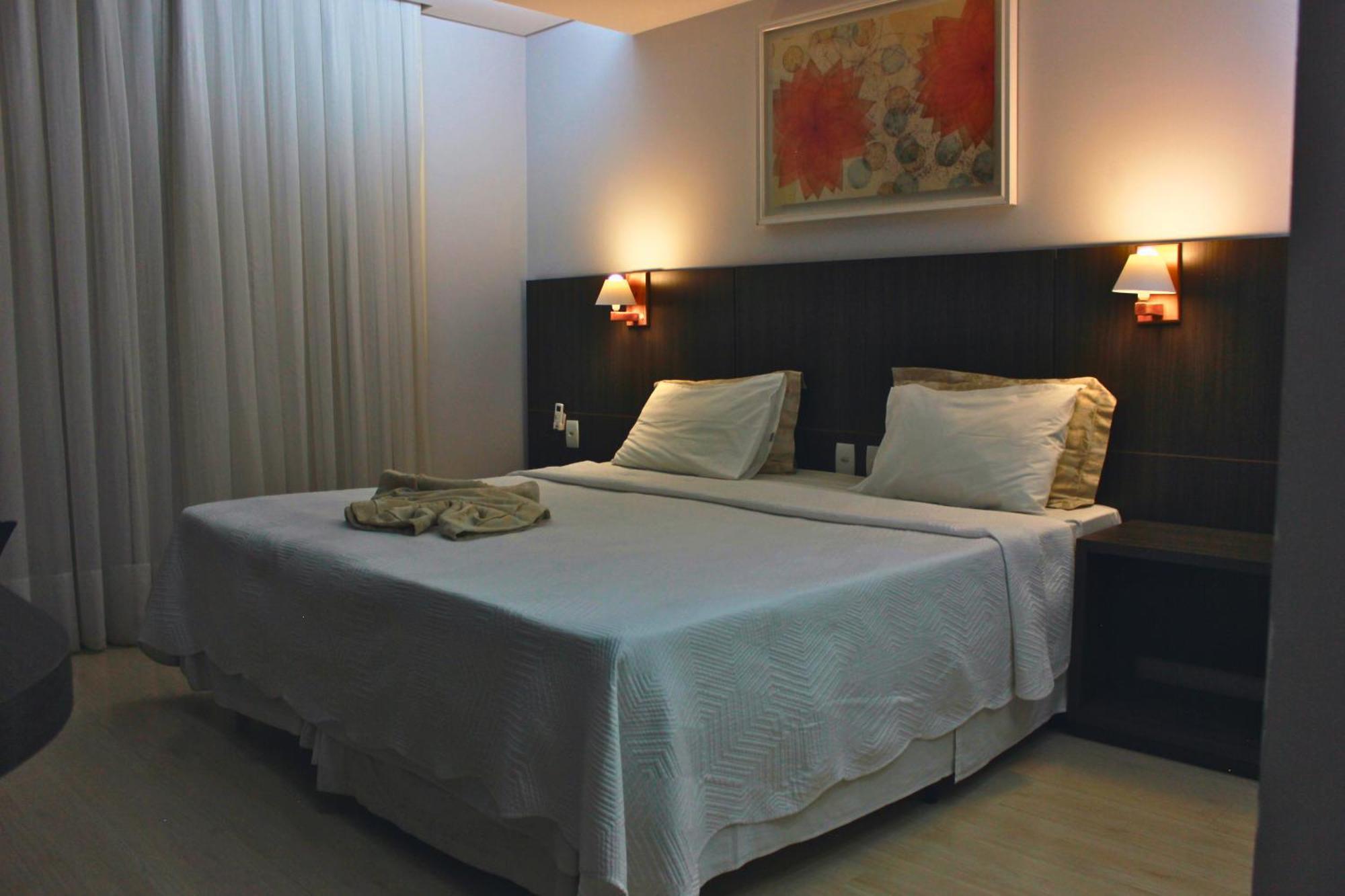 Gontijo Inn Hotel Itajubá Exteriör bild A bedroom