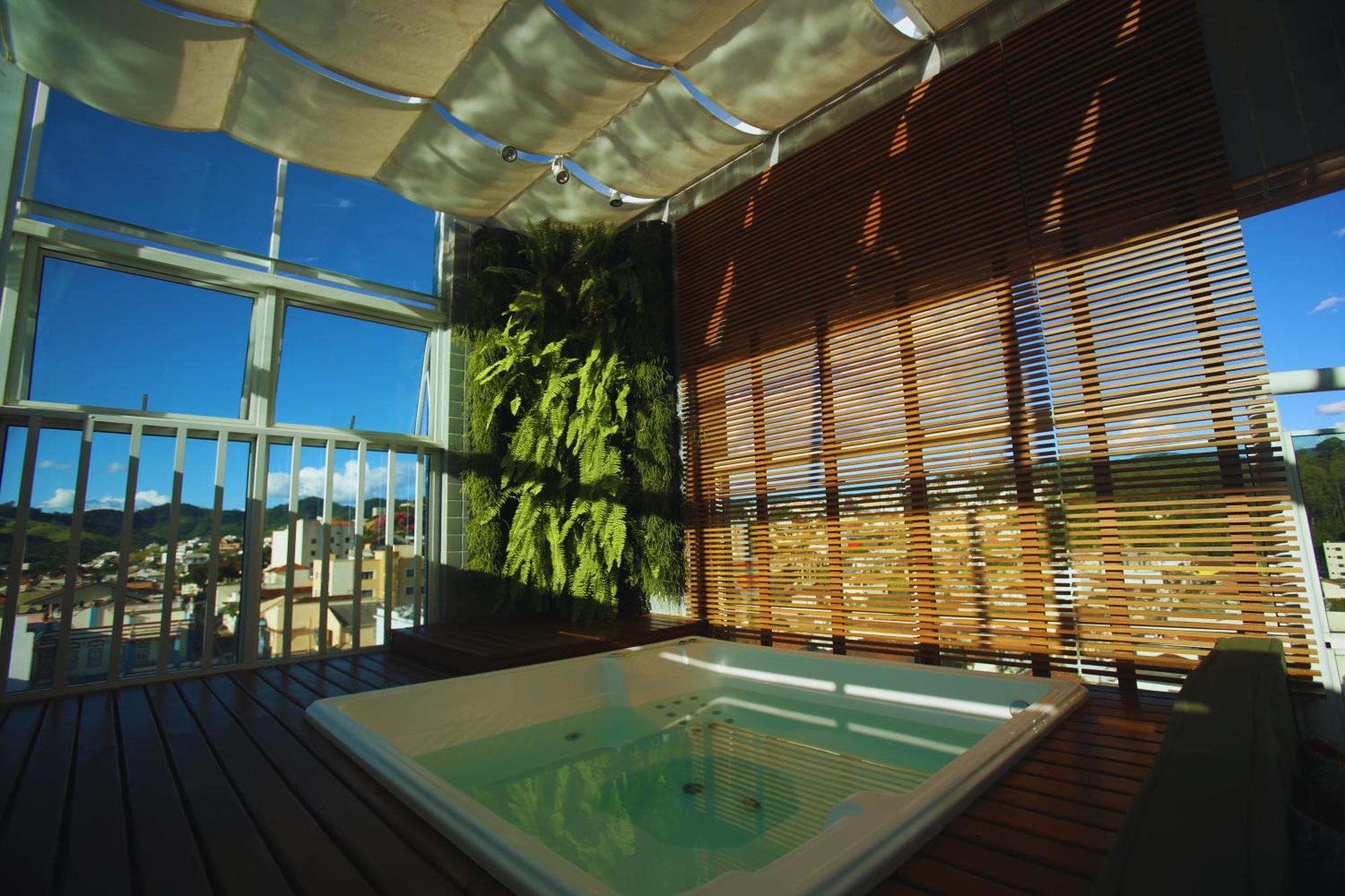 Gontijo Inn Hotel Itajubá Exteriör bild A rooftop spa